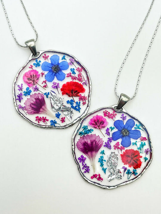 Statement necklace with colourful flowers in silver