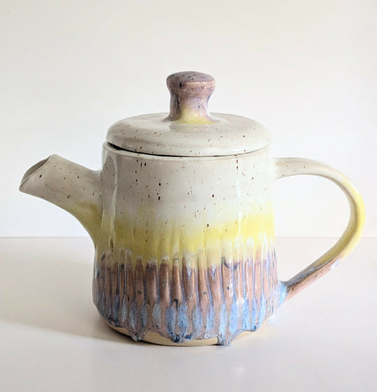 Teapot in yellow and purple