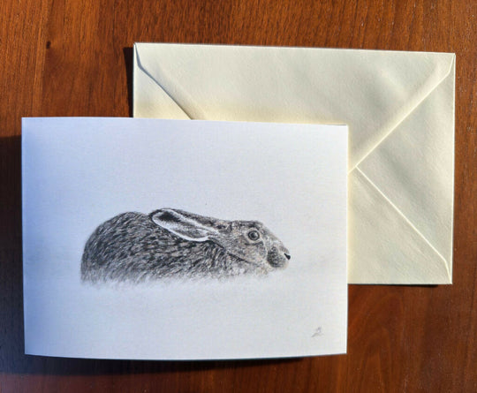 Winter hare Christmas card, 7x5inches in muted wintry colours