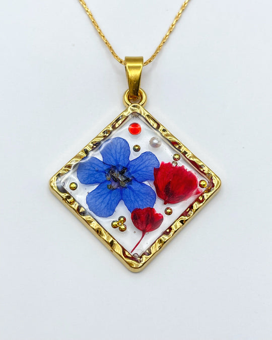 Square necklace with poppy and blue flowers