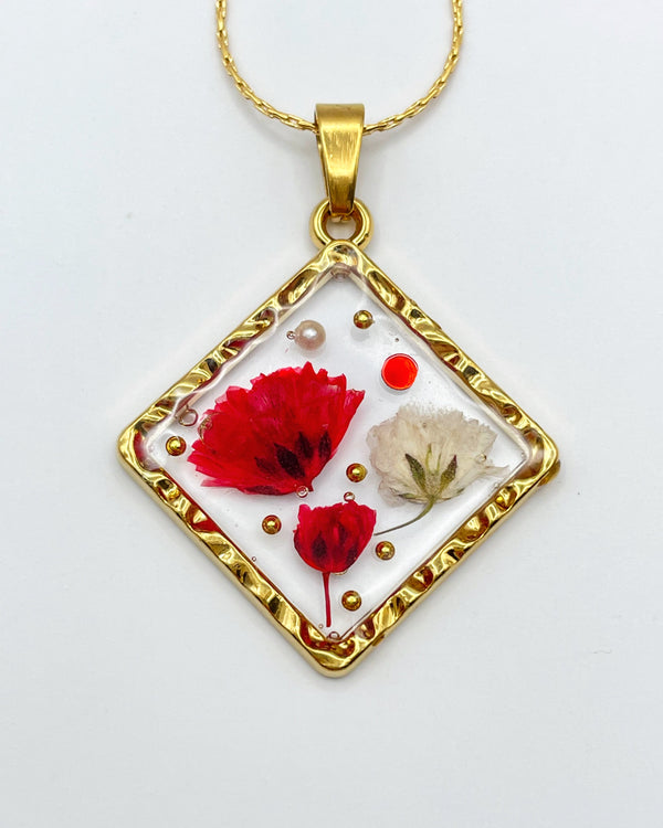 Square pendant necklace with poppy and gypsophila flowers