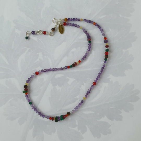 Delicate amethyst fragment gemstone necklace with russet hued gemstones.