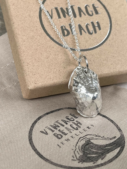 Fine silver limpet shell pendant