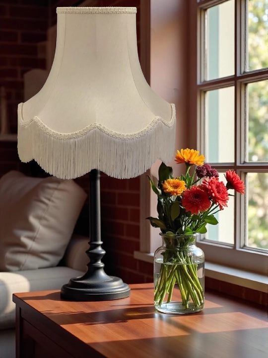 Cream fabric lampshades finished with a cream braid & fringe - Available in 8 sizes