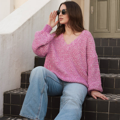 Zohar Twist Oversized V Neck Jumper in Pink