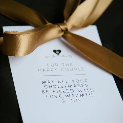 A printed message for this couples wedding gift of christmas stockings.