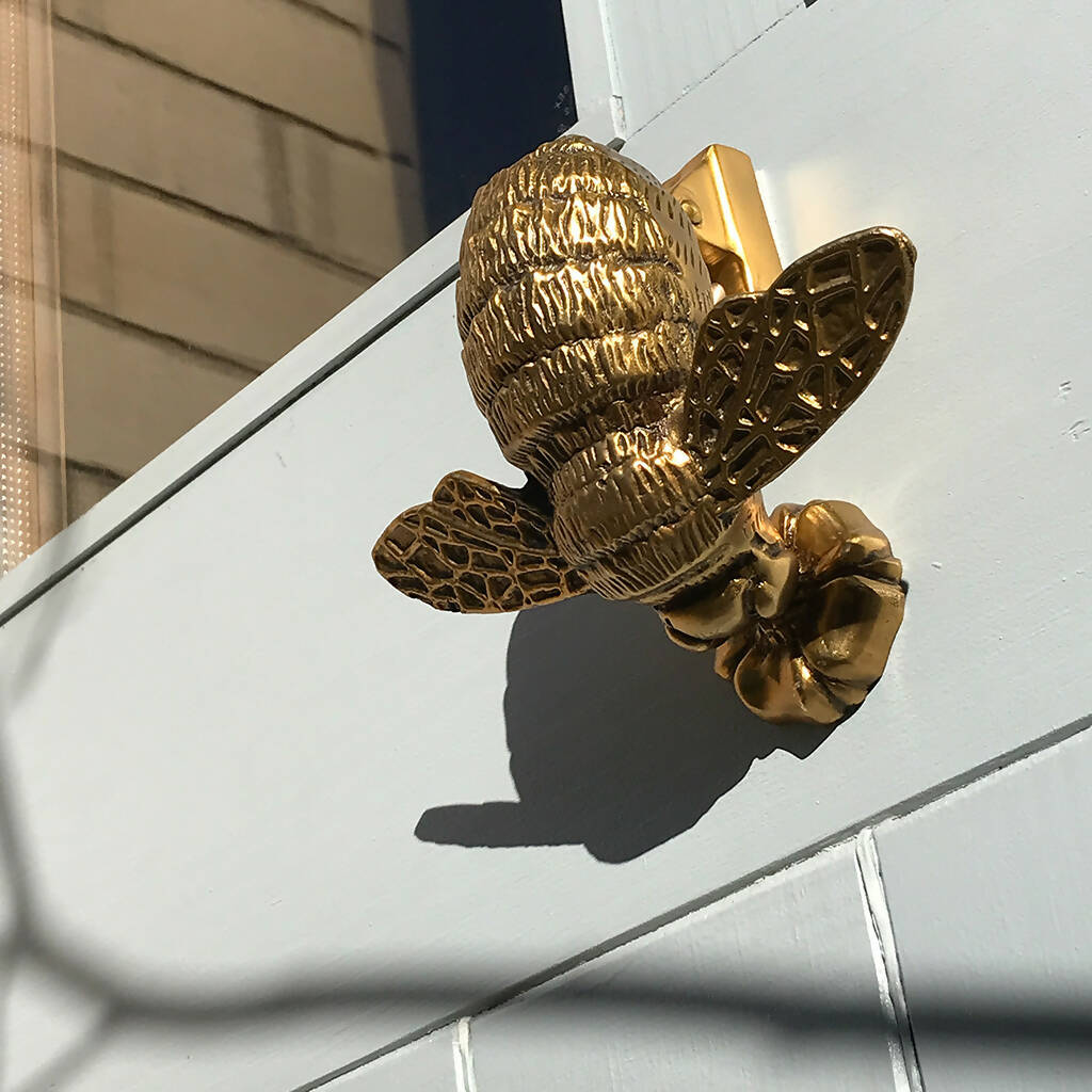 Cora Bee Door Knocker in Aged Brass