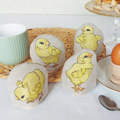 Complete Set of Four Embroidered Little Chick Egg Cosies by Kate Sproston Design