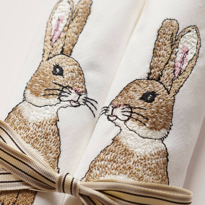 Close Up of Ivory Cotton Embroidered Easter Rabbit Napkins by Kate Sproston Design