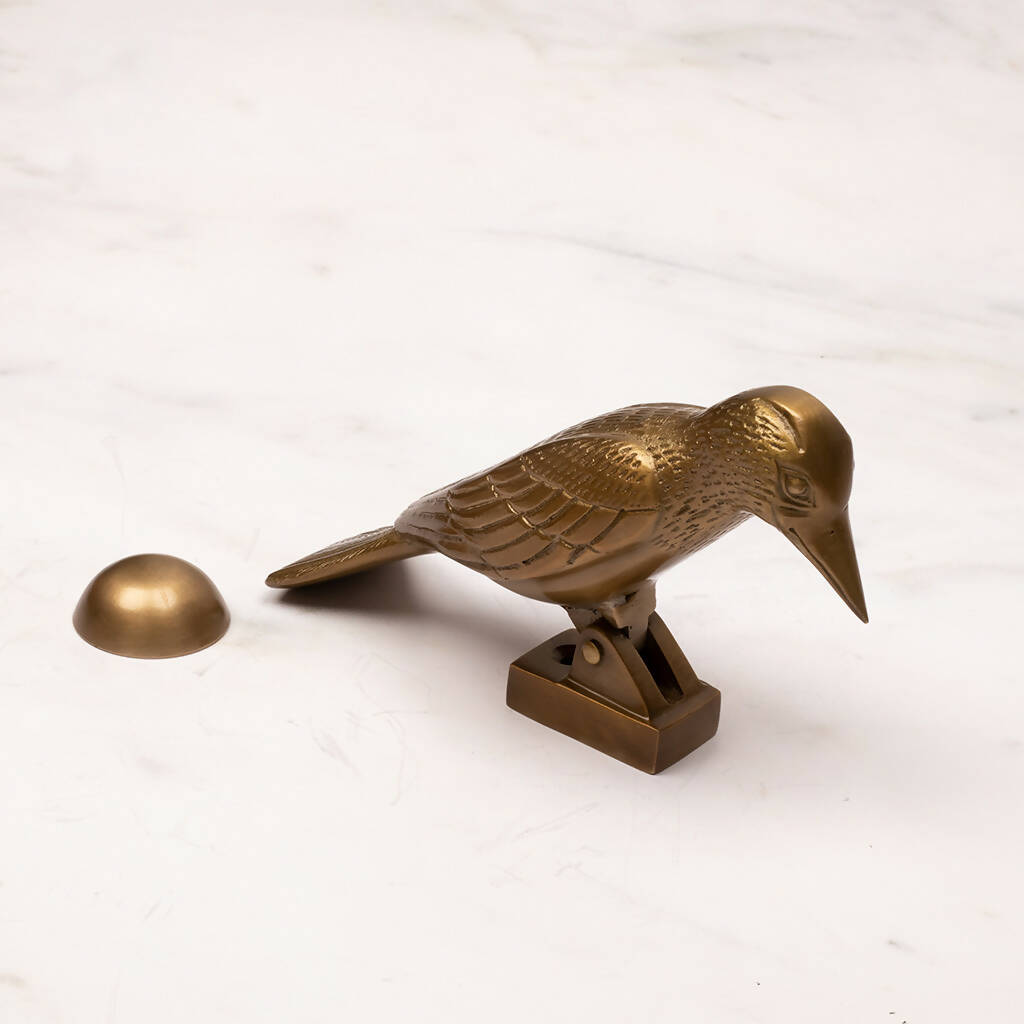 Cosima Woodpecker Door Knocker in Aged Brass