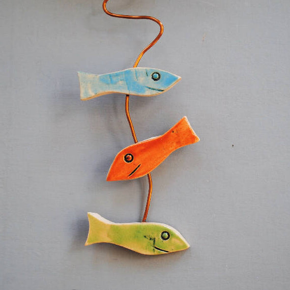 Round Ceramic Pendulum Wall Clock with Fish Shoal in Bright Colours
