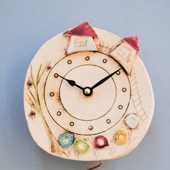 Round Ceramic Pendulum Wall Clock with Houses, Trees, and Meadows