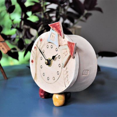 Small Pebble Feet Clock with House Design