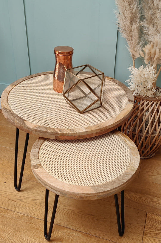 Round cane side table with rustic natural finish