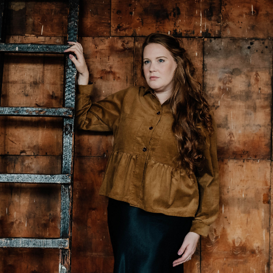 Dorothy Peplum Blouse In Doe