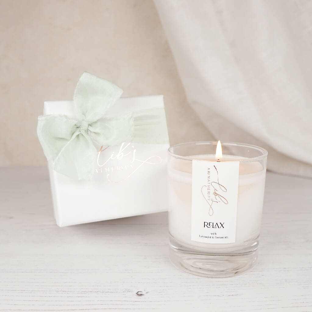 A relaxing candle with luxury box and mint ribbon