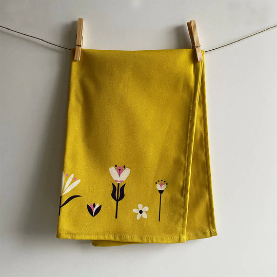 Paper Garden Tea Towel in Squash