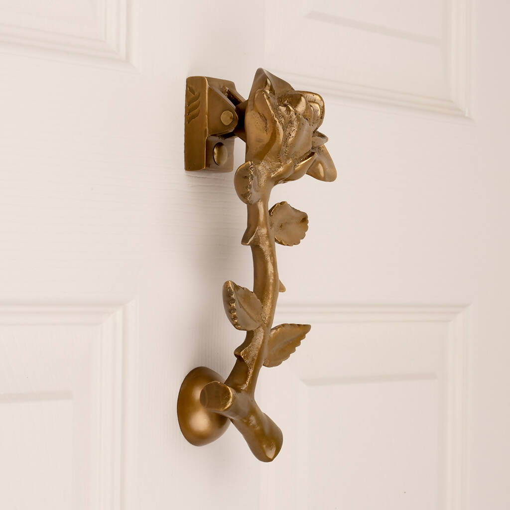 Nola Flower Door Knocker in Aged Brass