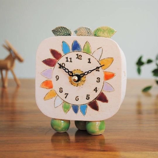 Small Handmade Clock with Pebble Feet and Rainbow Coloured Petals