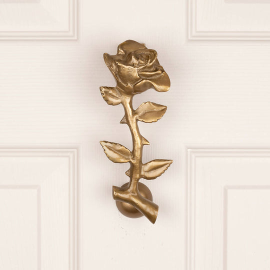 Nola Flower Door Knocker in Aged Brass