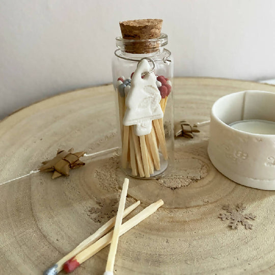 A Bottle Of Silver Bells Christmas Matches And Porcelain Charm