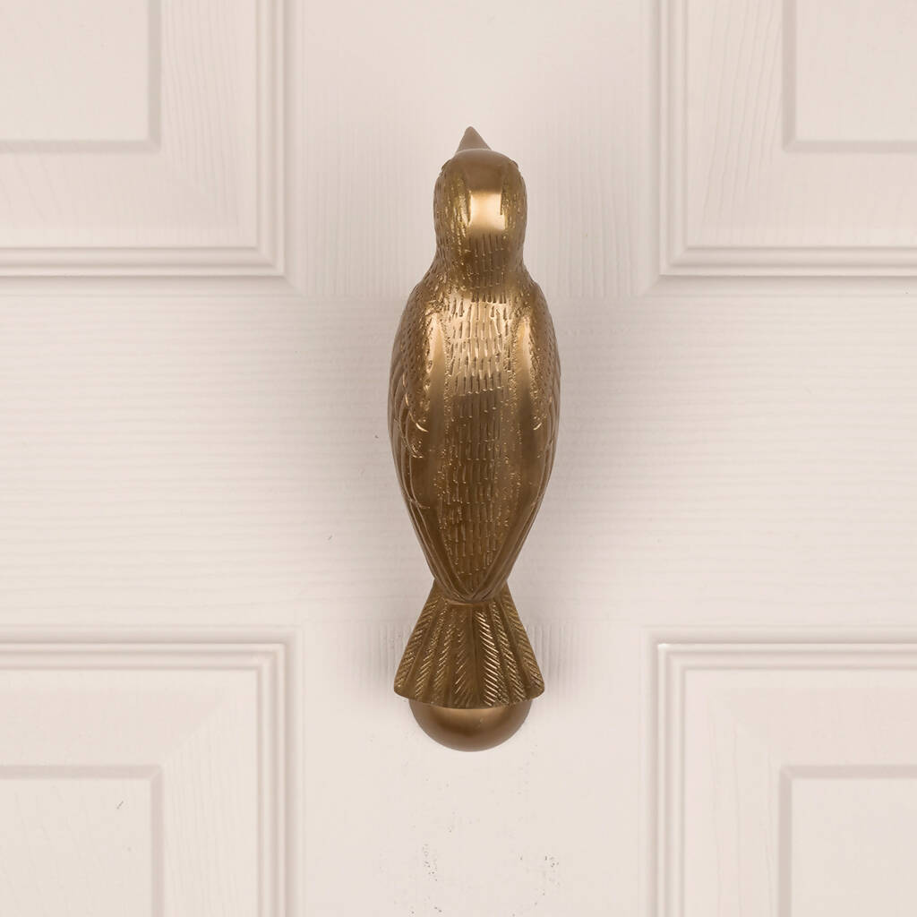 Cosima Woodpecker Door Knocker in Aged Brass